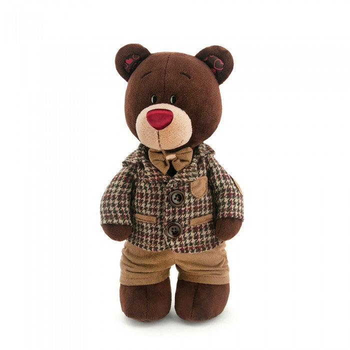 CHOCO STANDING IN A CHECKERED JACKET