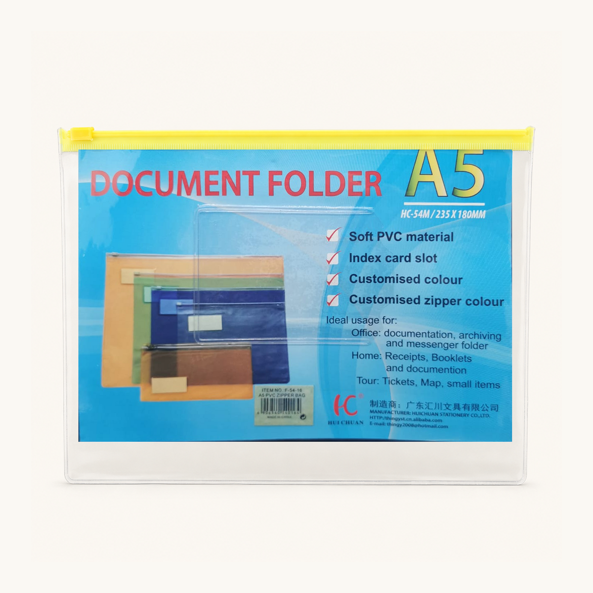 A5 PVC zipper bag with yellow closure — beige studio photograph, original printed insert retained